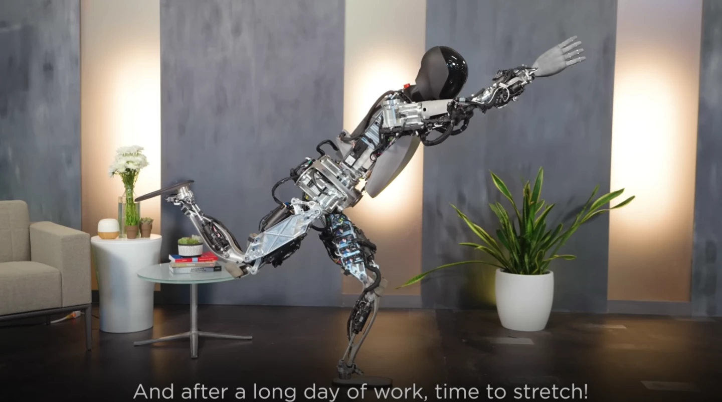 Optimus shows off its one-legged balancing skills