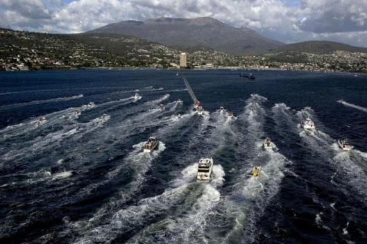 Wild Oats XI racing up the Derwent River in Hobart, Australia Photo by: Carlo Borlenghi