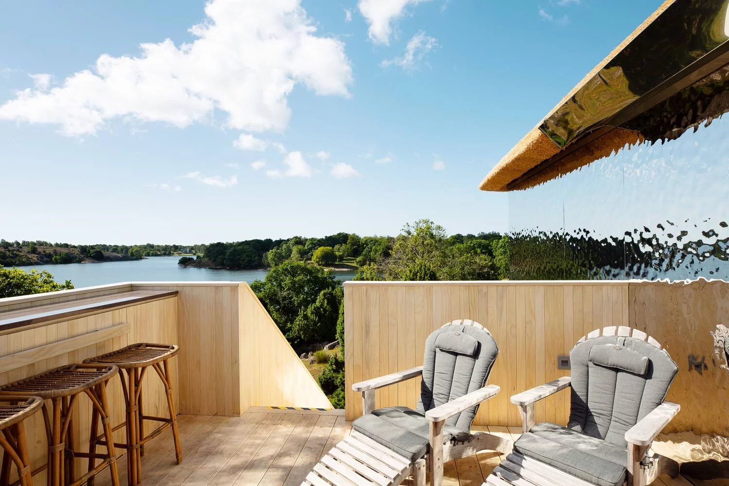 The SynVillan's terrace area is furnished and offers views over a private bay in the Baltic Sea