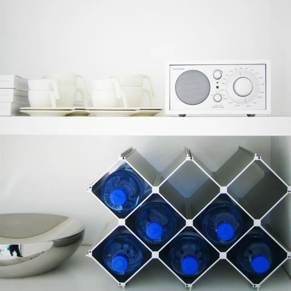 The Nucleus wine rack in use on a small counter