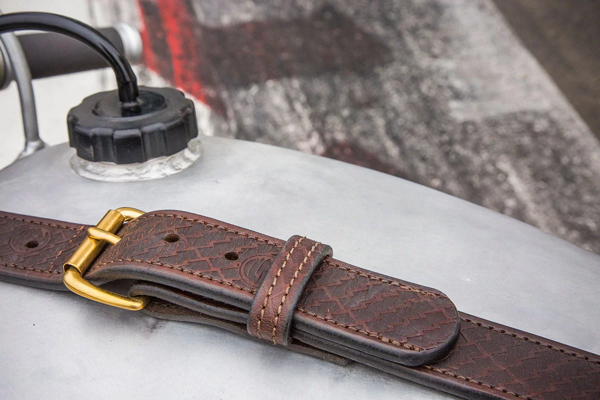 The leather belt holding the petrol tank is a wonderful vintage touch