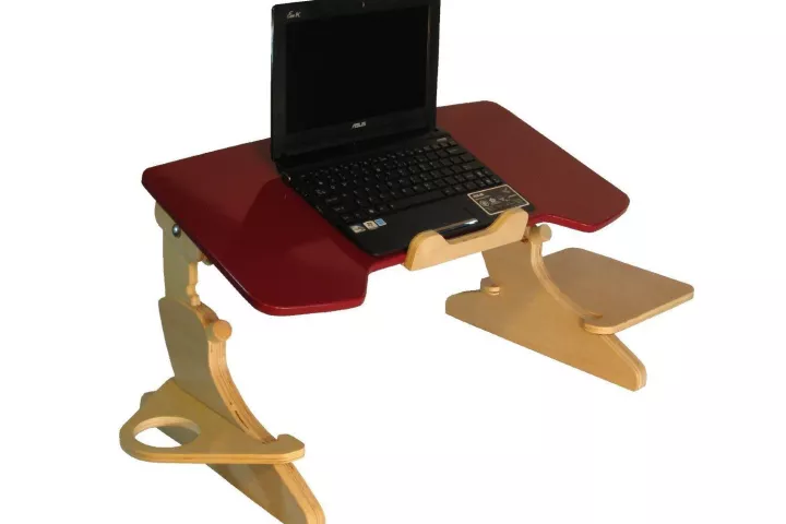 The ErgoArc is a laptop stand that allows people to use their computers while in bed