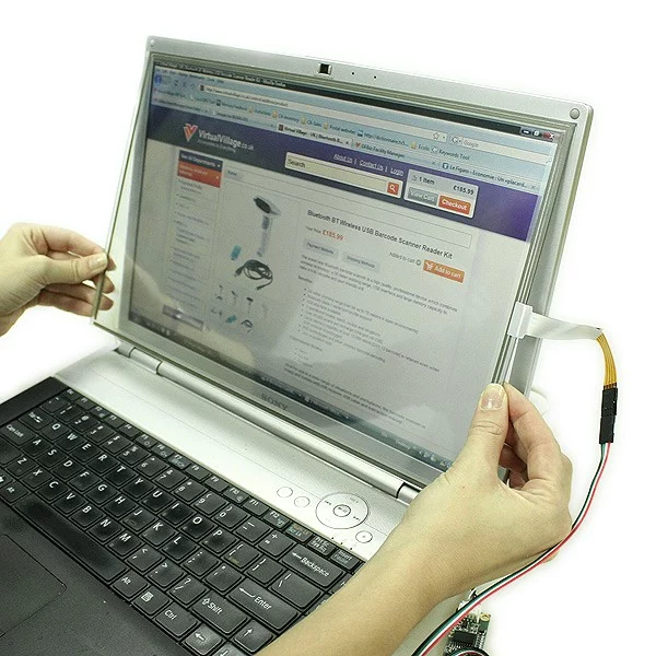 The resistive touchscreen kit placed on top of the Carbon Tablet's screen