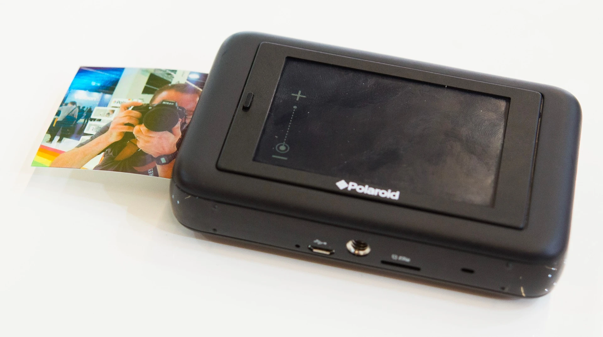 Prints emerge from the Polaroid Snap Touch in about a minute