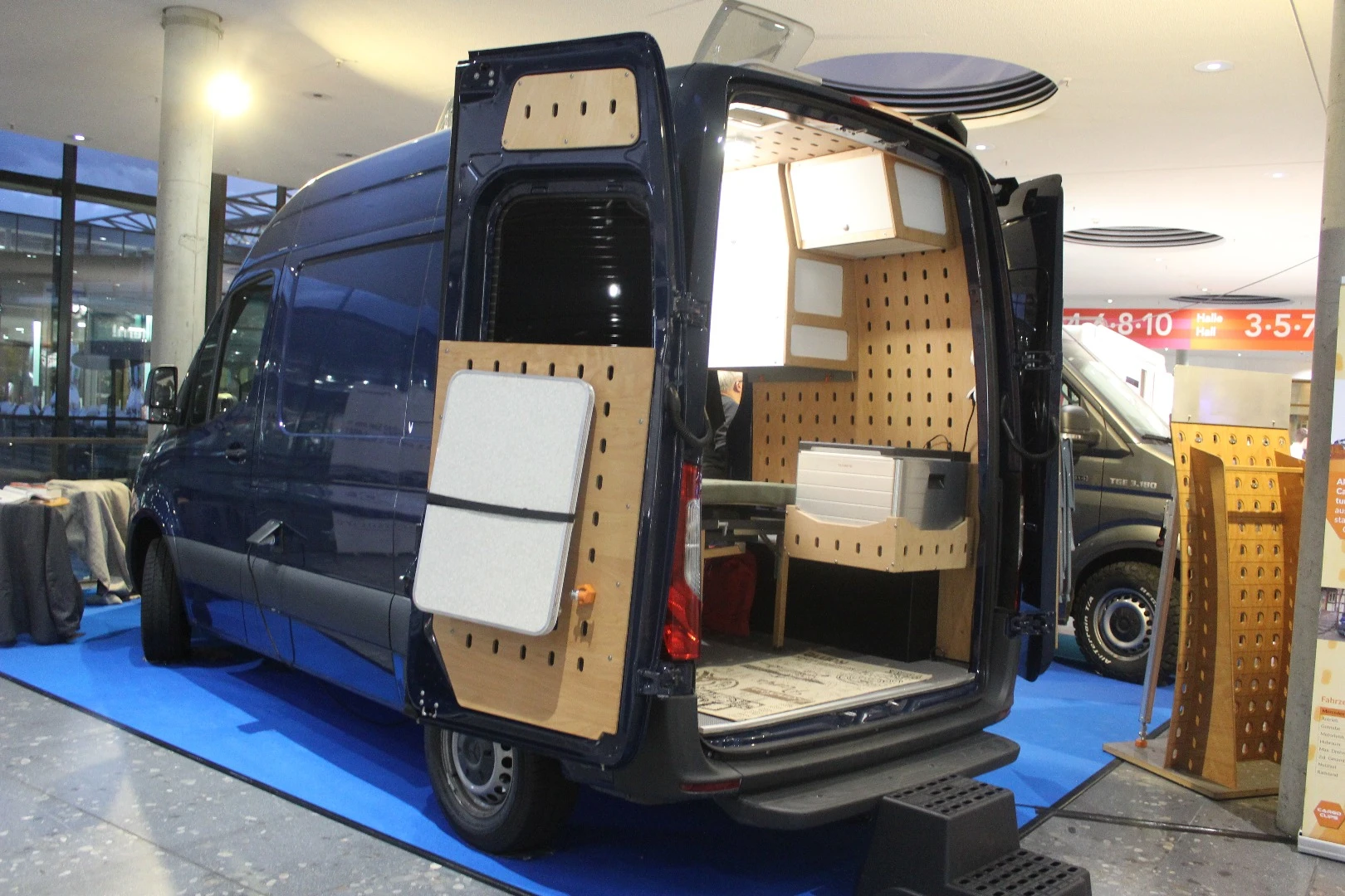 Very different from the average camper conversion, the Cargo Camper kit features pegboard-style wall, ceiling and floor paneling, allowing for versatile installation and removal of camping furniture and hardware