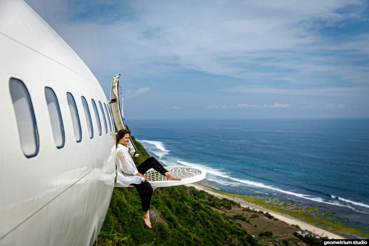 The Private Jet Villa's original doors open onto netted seating areas