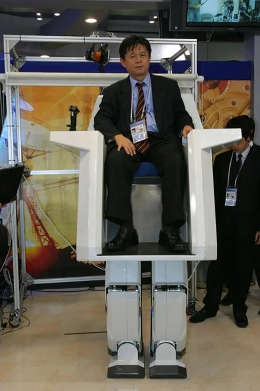 Dr. Munsang Kim (KIST) rides on the HUBO FX-1, a walking chair robot (Photo: KAIST Hubo Lab)