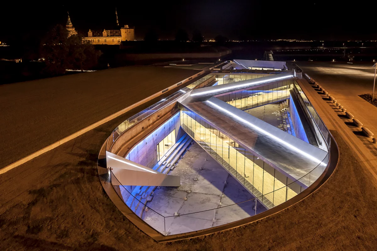 The museum is sunk into a former dry dock, and located adjacent to the historical Kronborg castle (Photo: BIG)