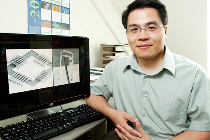 Min-Feng Yu, a professor of mechanical science and engineering, has developed a novel approach for manufacturing metal interconnects (Image: L. Brian Stauffer)