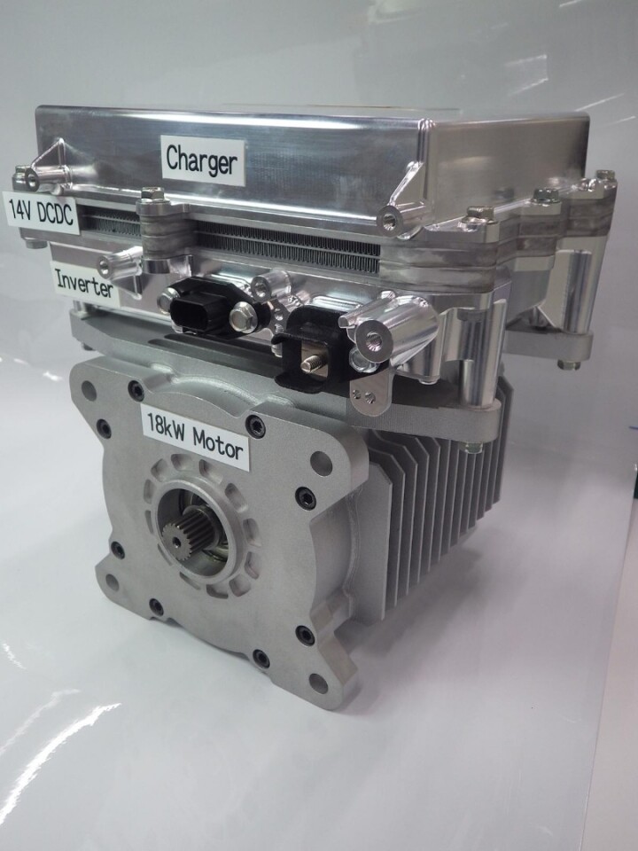 The motor/inverter/charger module lives in the lower "e-Torta" layer of the SPACe_C vehicle architecture