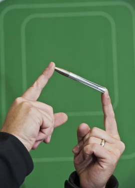 The self-guided bullet developed by Sandia National Laboratories is four inches long and can hit laser marked targets located over a mile away (approx. 2,000 meters)