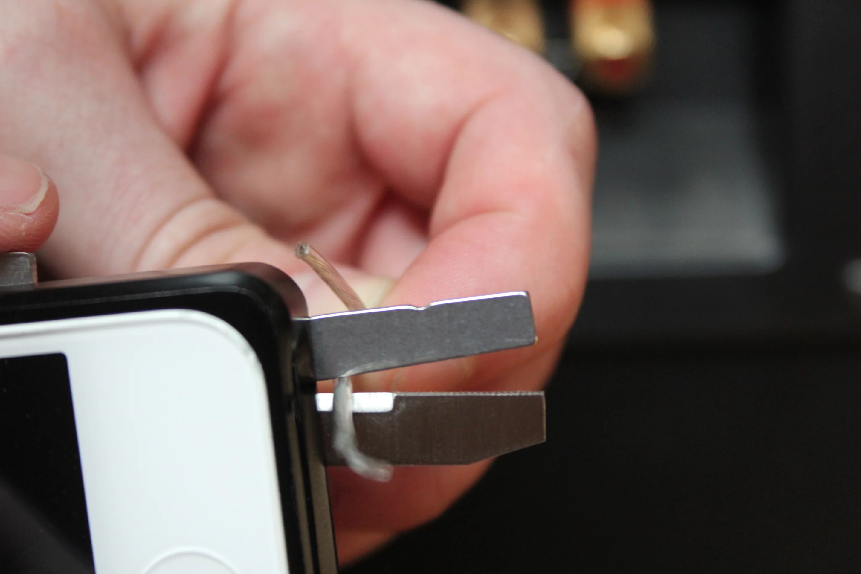 The TaskOne has a wire stripper and a wire cutters