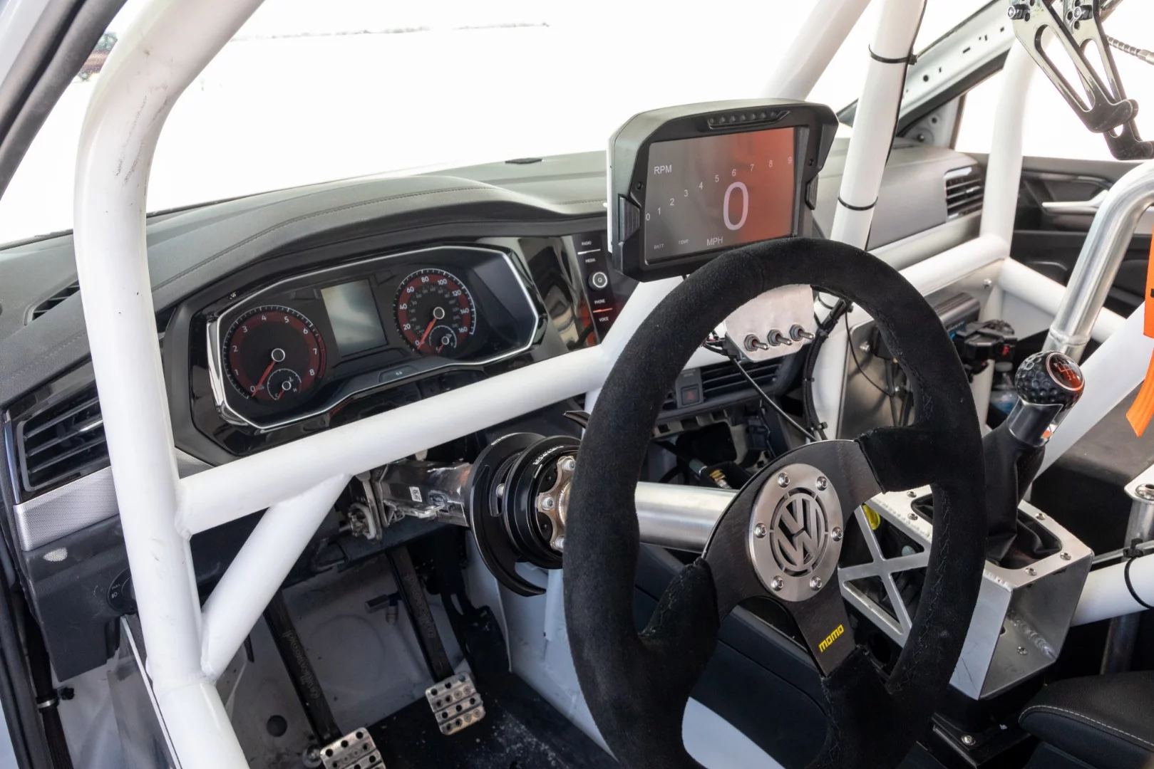 Salt flats veteran racer Scott Goetz brought a modified VW Jetta to a record track speed of 210.16 mph (338.15 km/h)