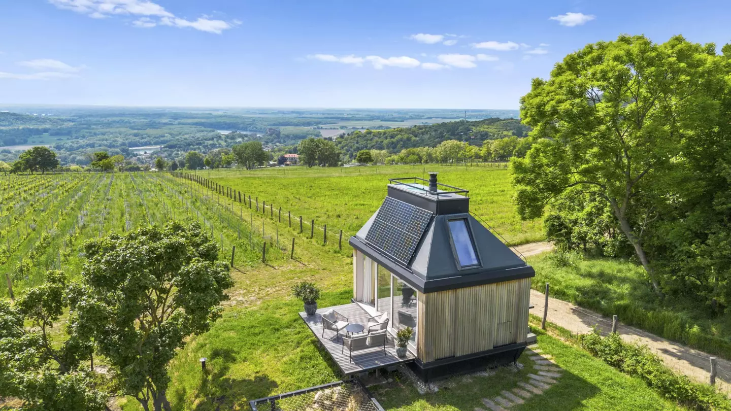 Cabin Devín is a compact tiny house that runs off-the-grid and has a light-filled space-saving layout