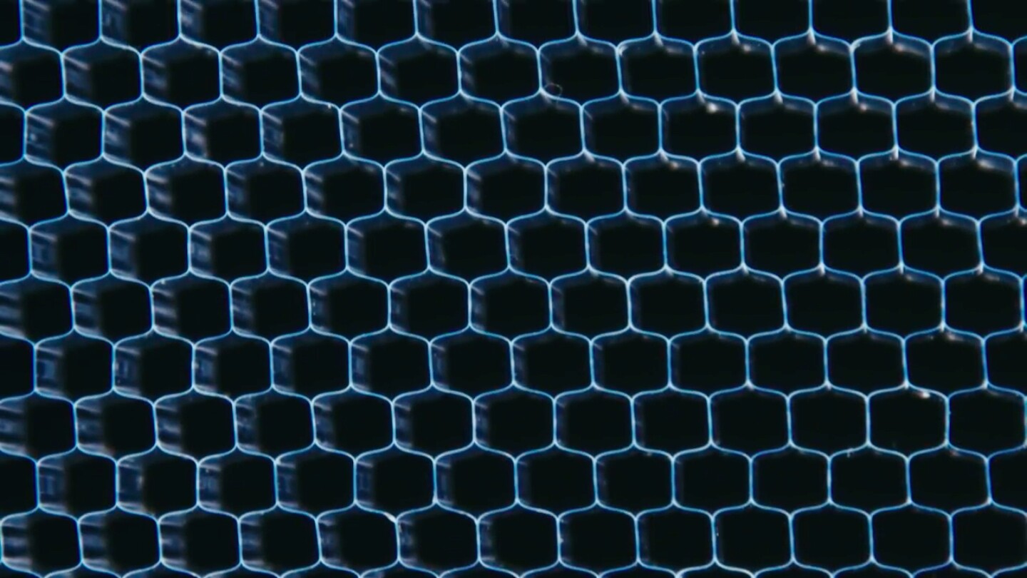 The acoustic meta-material is a lattice structure covered by a thin plastic film