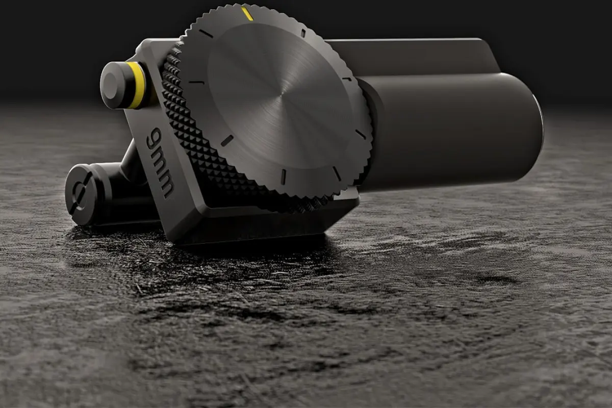 When it comes to unlocking the gun, users enter a pin code by turning a dial on the side of the attachment