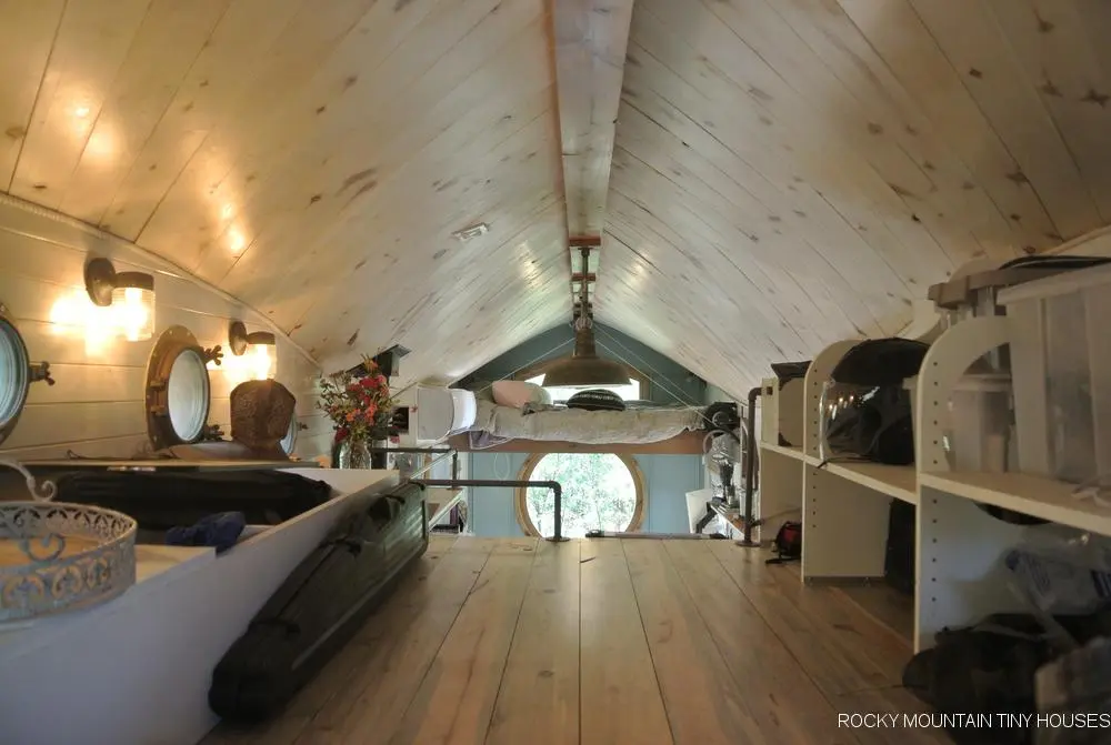 The San Juan Tiny House has a secondary loft that's used as storage space and a second bedroom