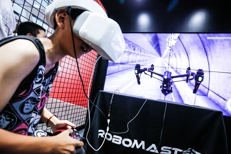 Competition visitors can play their own virtual RoboMaster games using VR headgear
