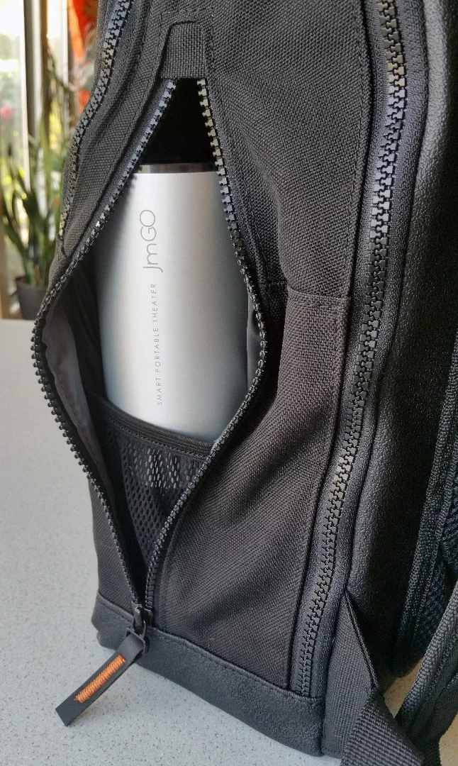 The MOS Pack features an interior pocket that can (reasonably) fit 18 oz water bottles or a JmGO View projector