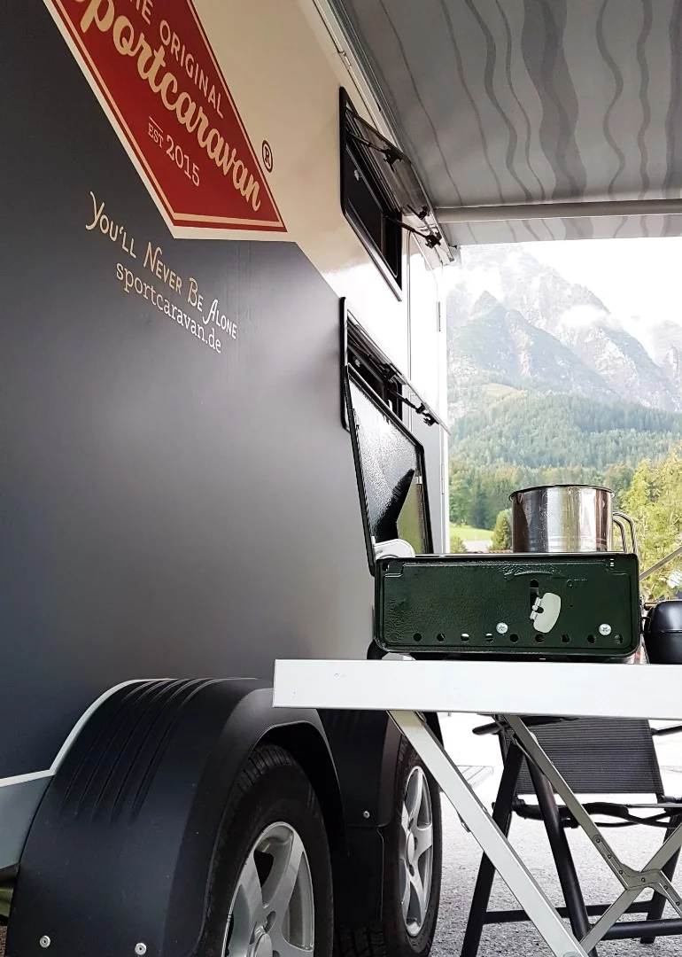 The optional awning and side walls offer extra shade and protection