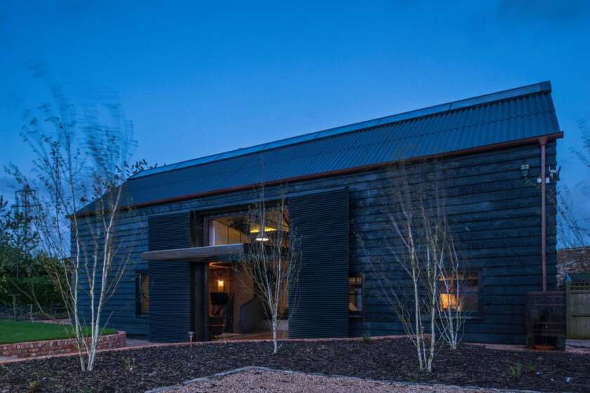 Liddicoat & Goldhill fitted large insulated shutters which open to reveal a generous glazed area