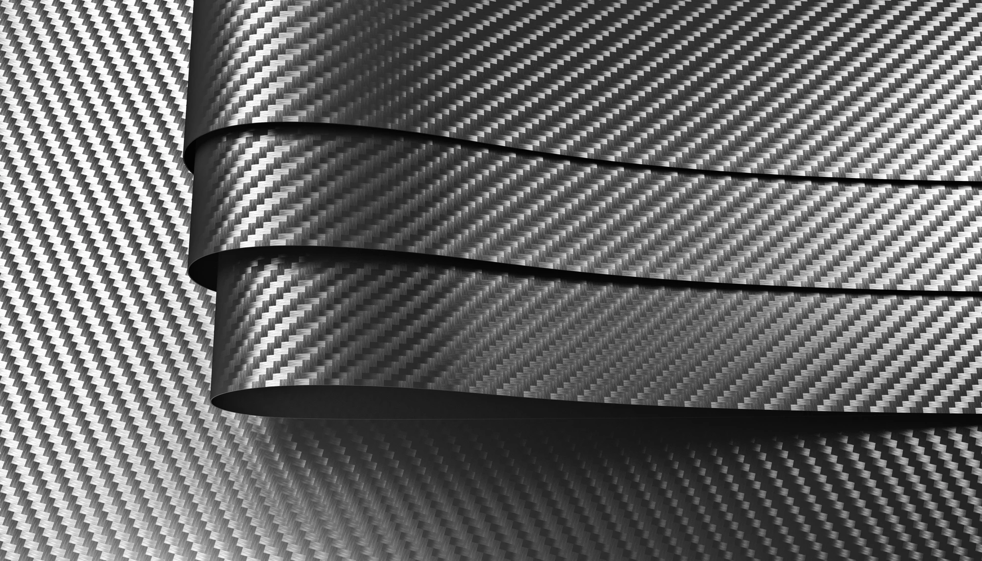 Adding a dash of graphene to the production process of carbon fiber has been shown to boost its strength and stiffness, while possibly making it cheaper at the same time
