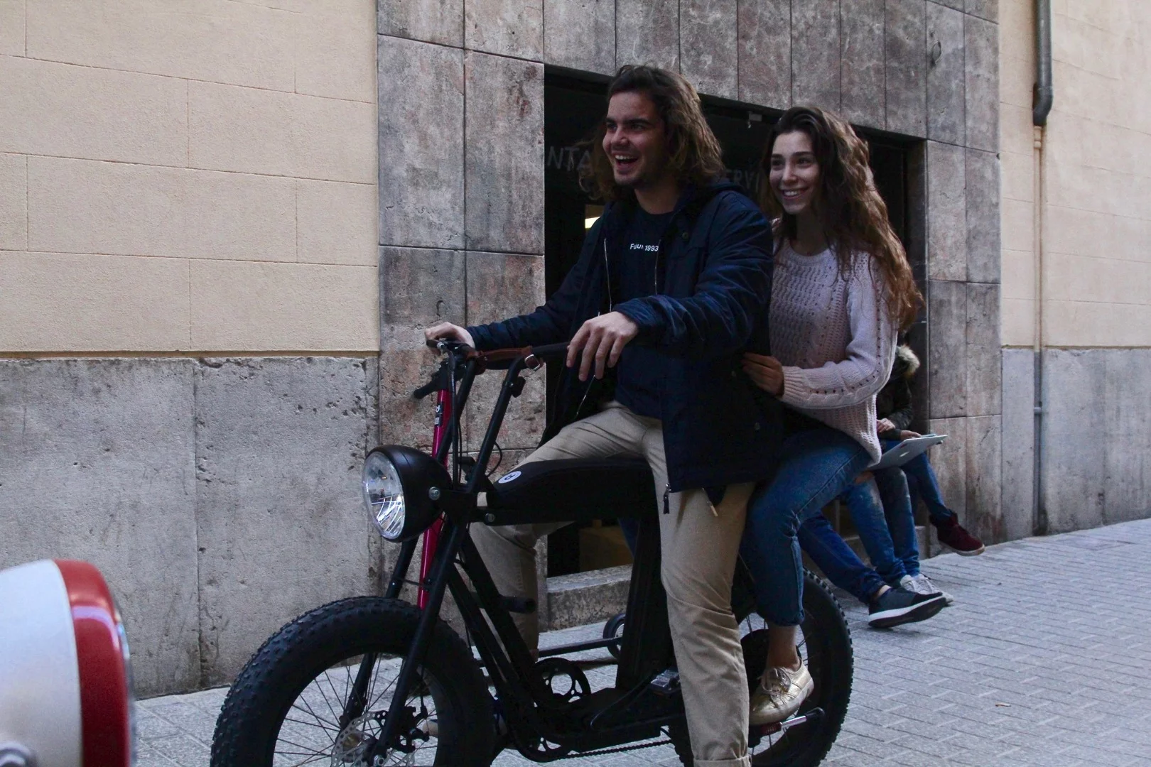 Unlike the typical electric bicycle, the Moke carries two adults