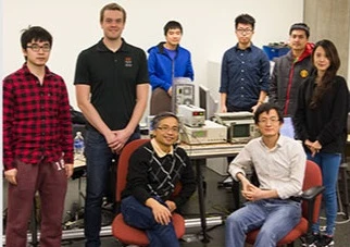 The WiFO research team. Front: Thinh Nguyen and Alan Wang. Standing: Songtao Wang, Spencer Liverman, Thai Phu Duong, Qiwei Wang, Duong Nam Nguyen-Huu, Yu-Jung Chu (Photo: Oregon State University)