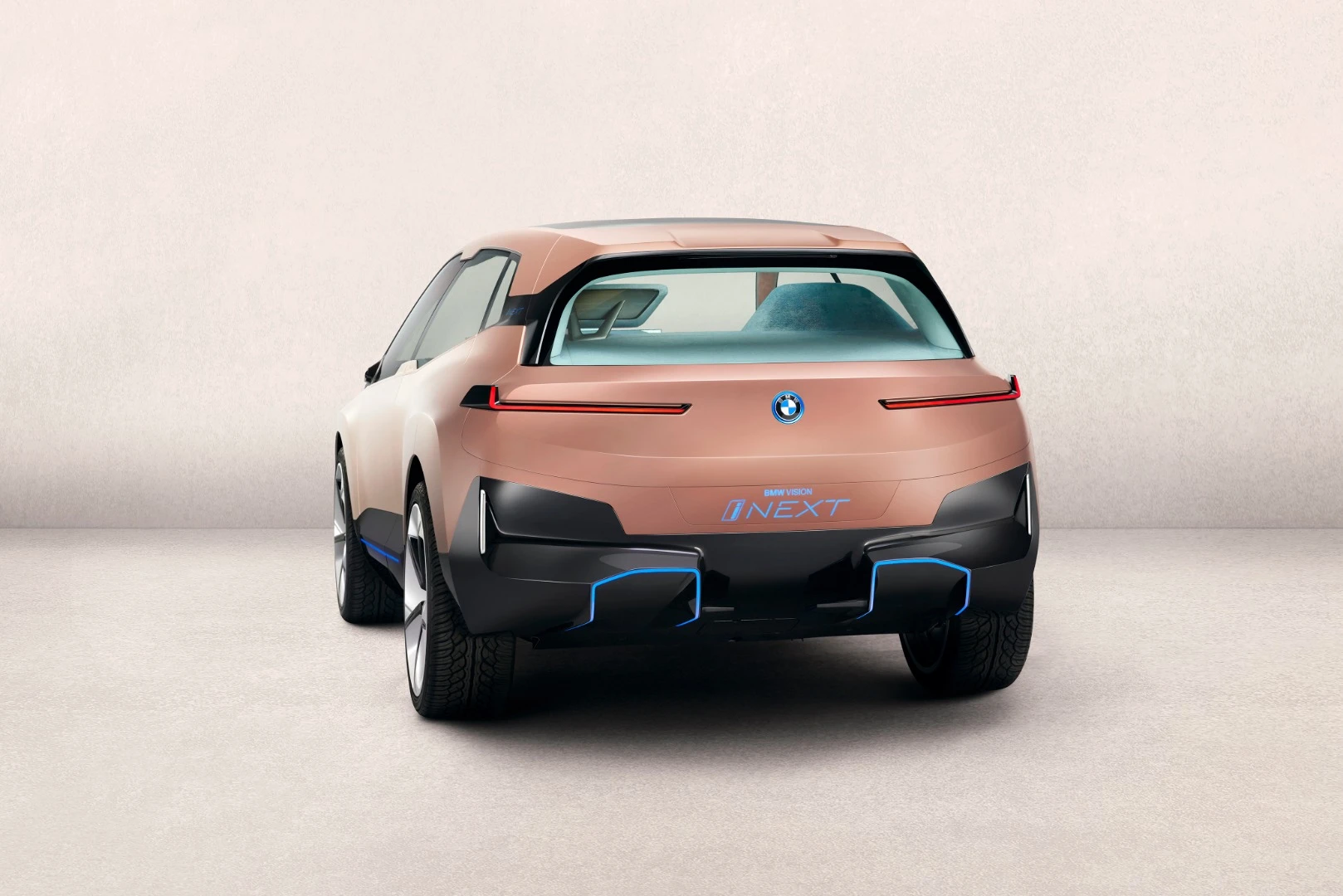 Smooth lines and a lack of prominent adornment mark the rear of the BMW Vision iNext concept