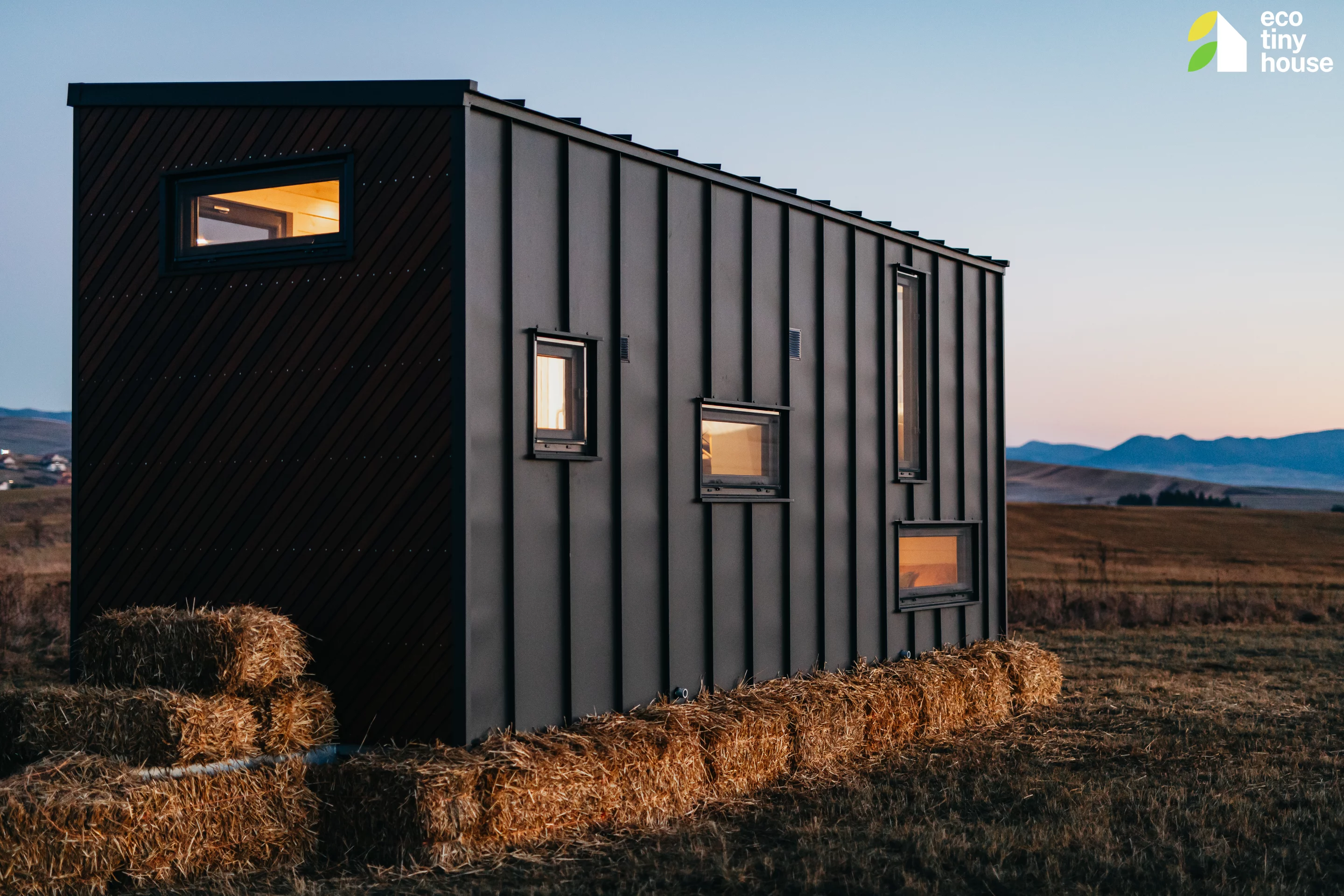 The Tiny Getaway's exterior is finished in thermally treated ayous wood, with a steel rear and a sloping metal roof