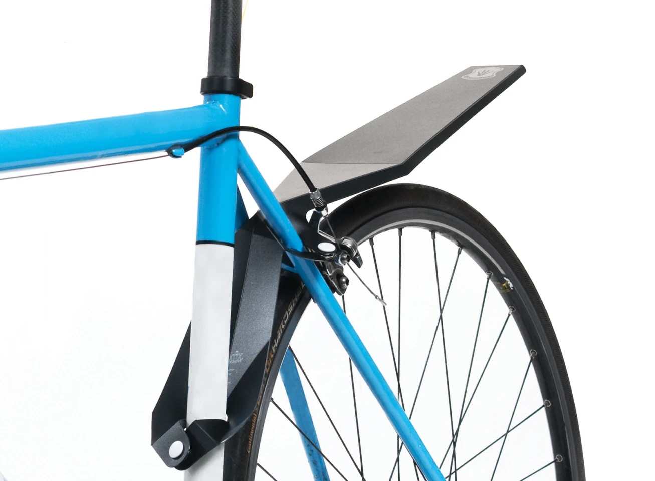 The QuickFix mudguard attaches to a bike in seconds, and packs flat when not in use