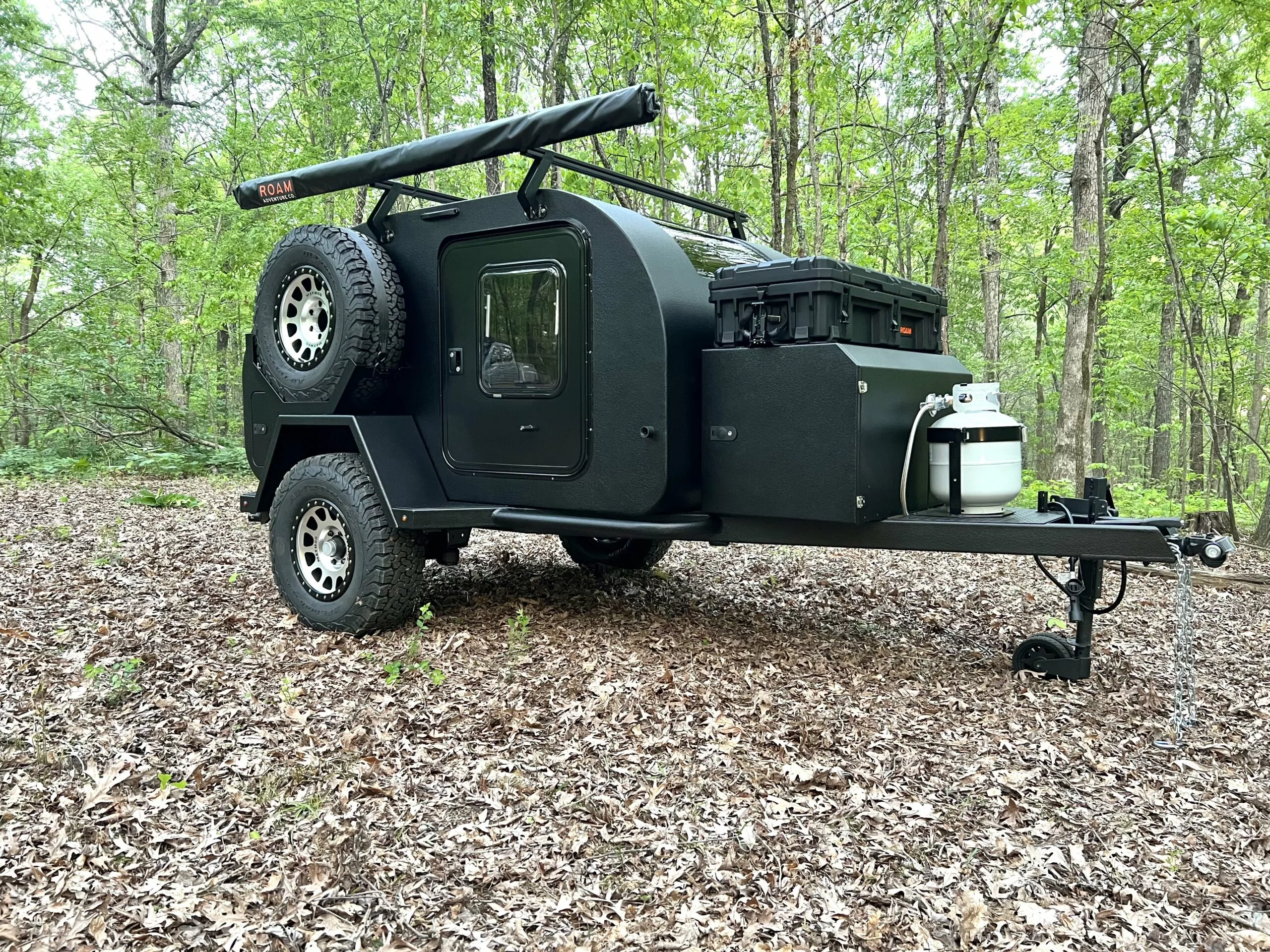 The Vega 2.0 XT includes a front propane mount and a side-mounted full-size spare wheel