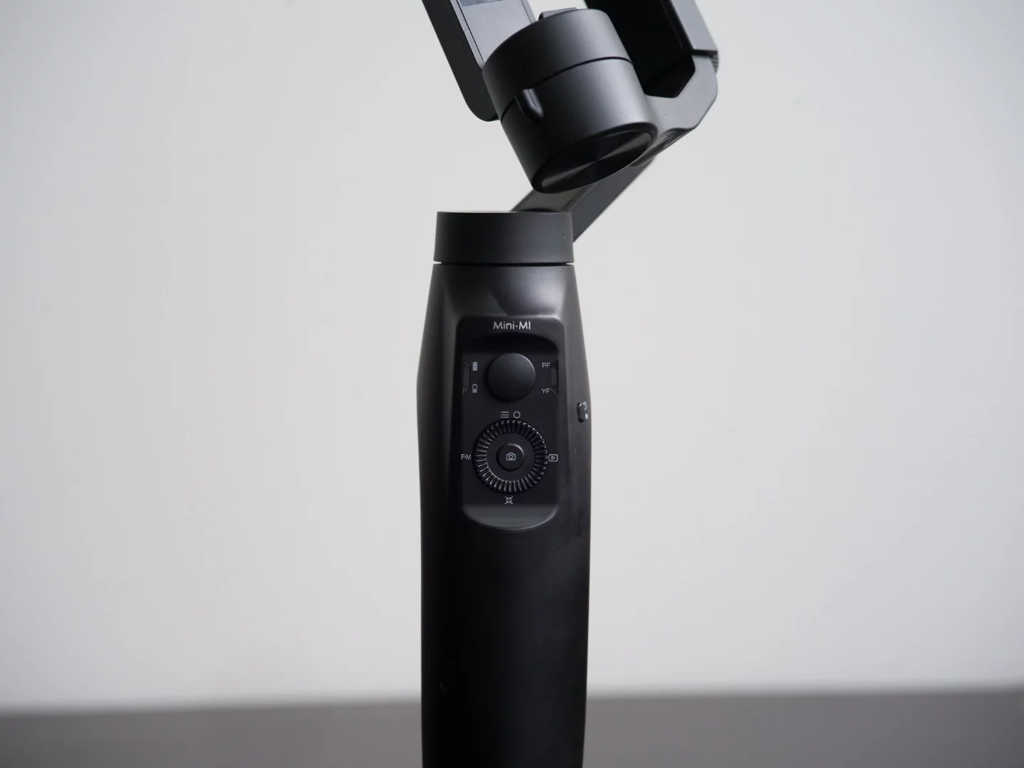 Moza Mini-Mi: thumb controls. It doesn't have a trigger