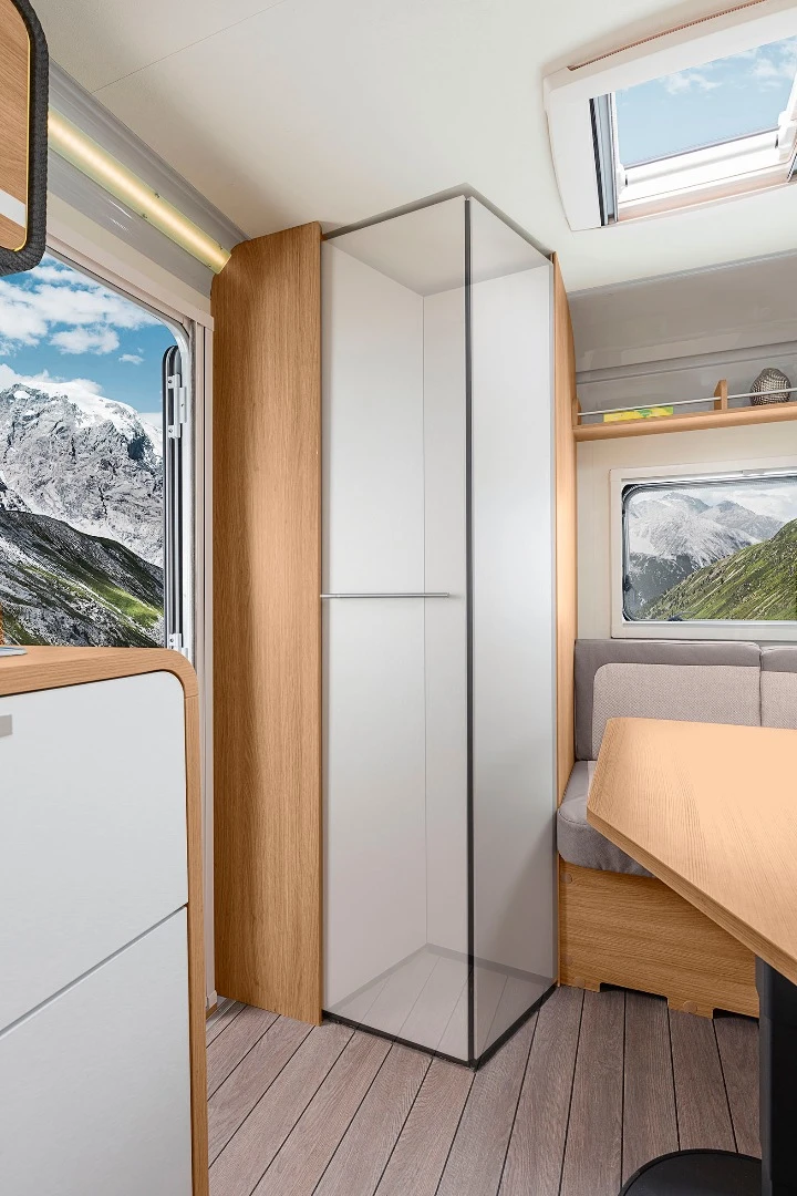 The two-panel bathroom door can expand out or contract in as needed