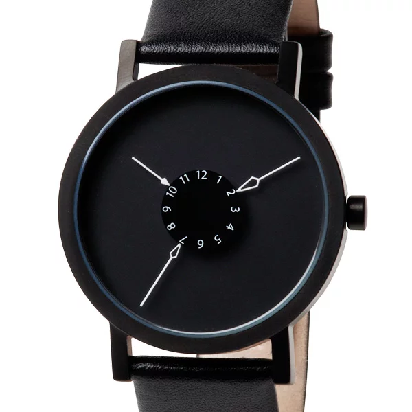 Nadir features a black leather strap and black stainless steel face, with both the numbers and hands picked out in white