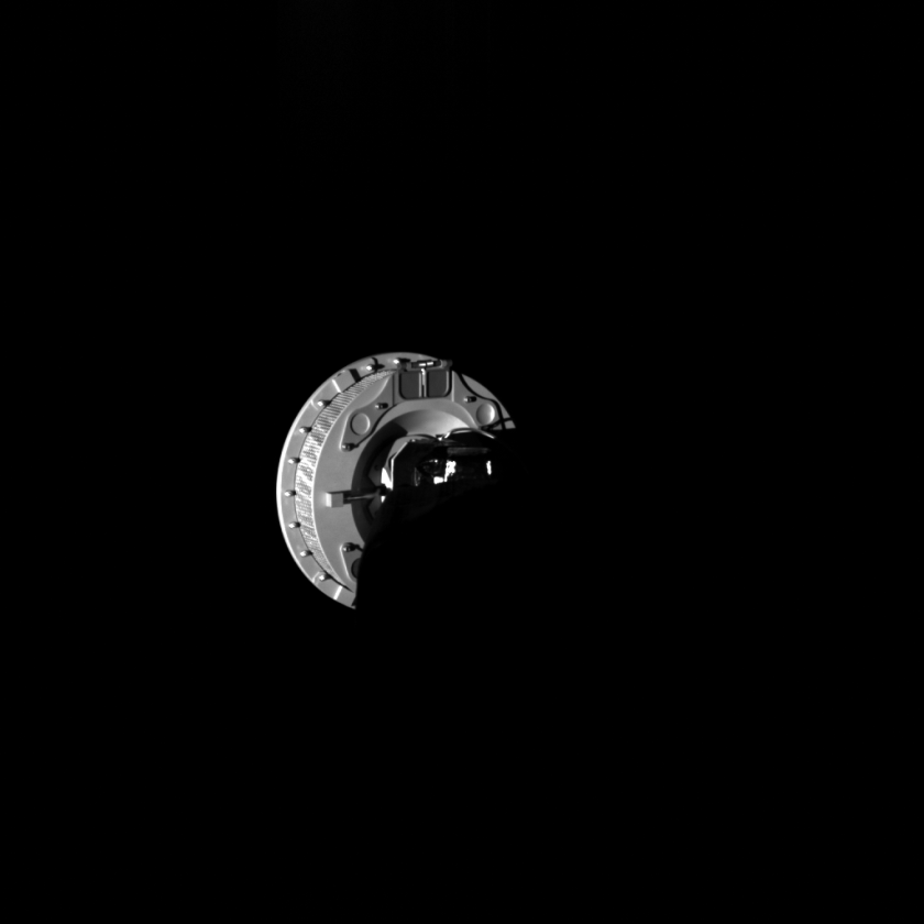 The OSIRIS-REx's TAGSAM arm imaged extending into space