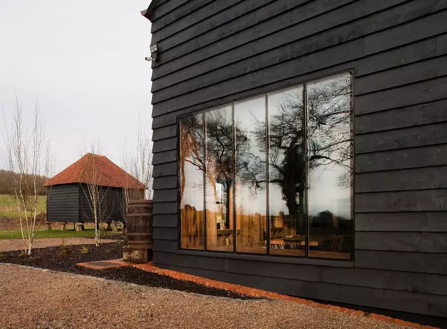 The oddly-named Ancient Party Barn features restored original wood throughout