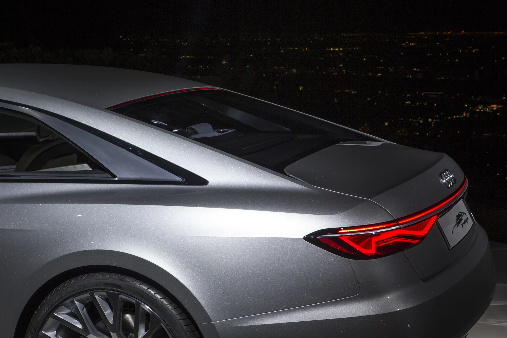 It's nearly a hatchback, but the Prologue's trunk is separated from the cabin