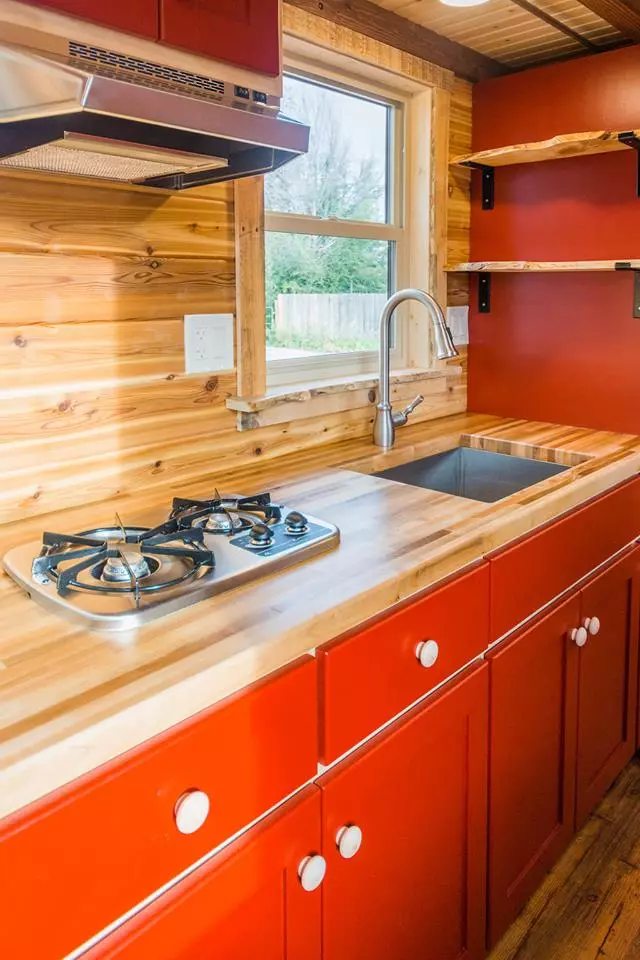 Davis's 22 ft Off-Grid Tiny Home gets power from a solar panel setup hooked up to a battery array