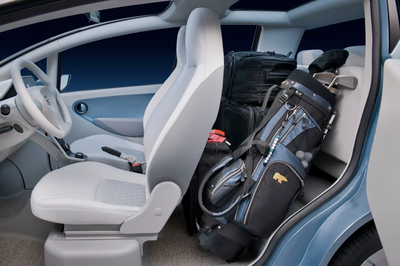 The Tata eMO's back seats fold up to allow for more cargo space