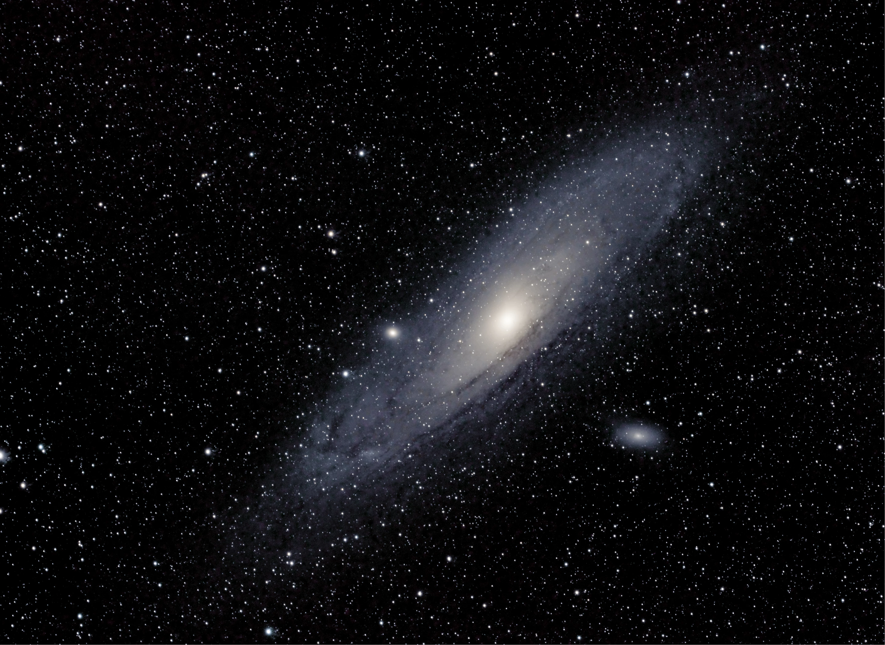 Highly Commended - Young Competition. Collision Course! An image of the Andromeda Galaxy (Messier 31) as well as two smaller galaxies (Messier 32 and Messier 110)