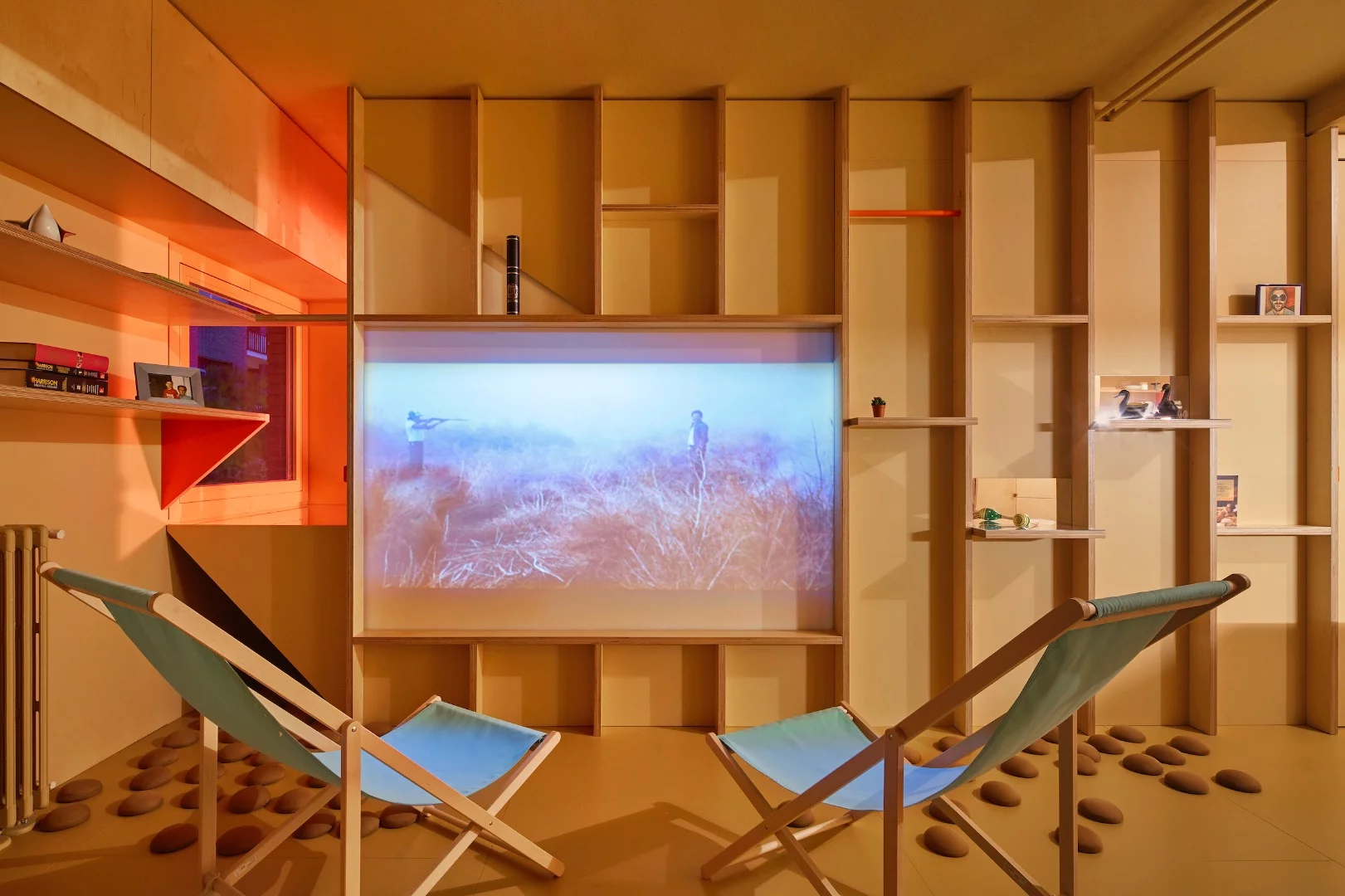 The sleeping pod, shown with the cover pulled down to serve as a projection screen