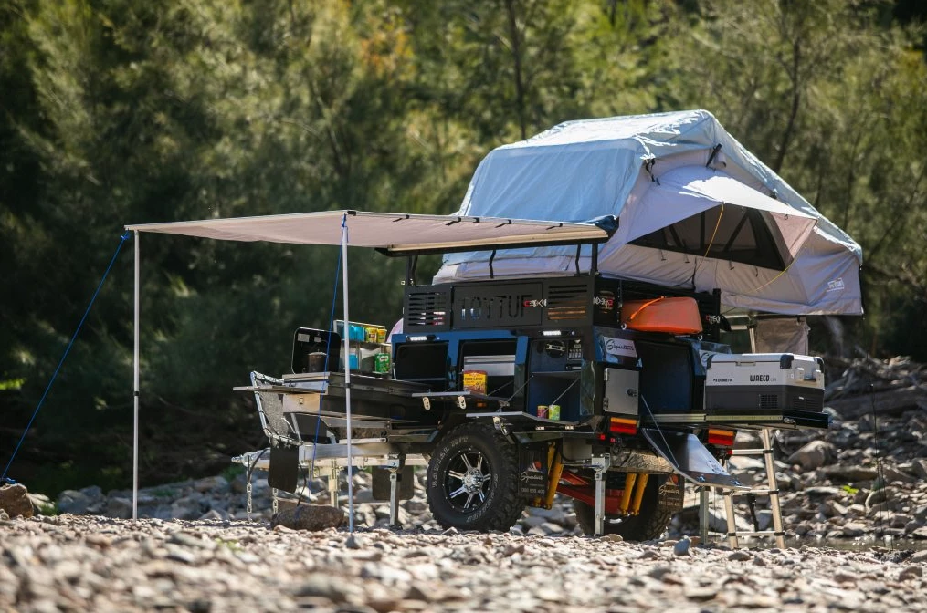Once parked at camp, the Deluxe II expands in every direction to create a comfortable home on the range