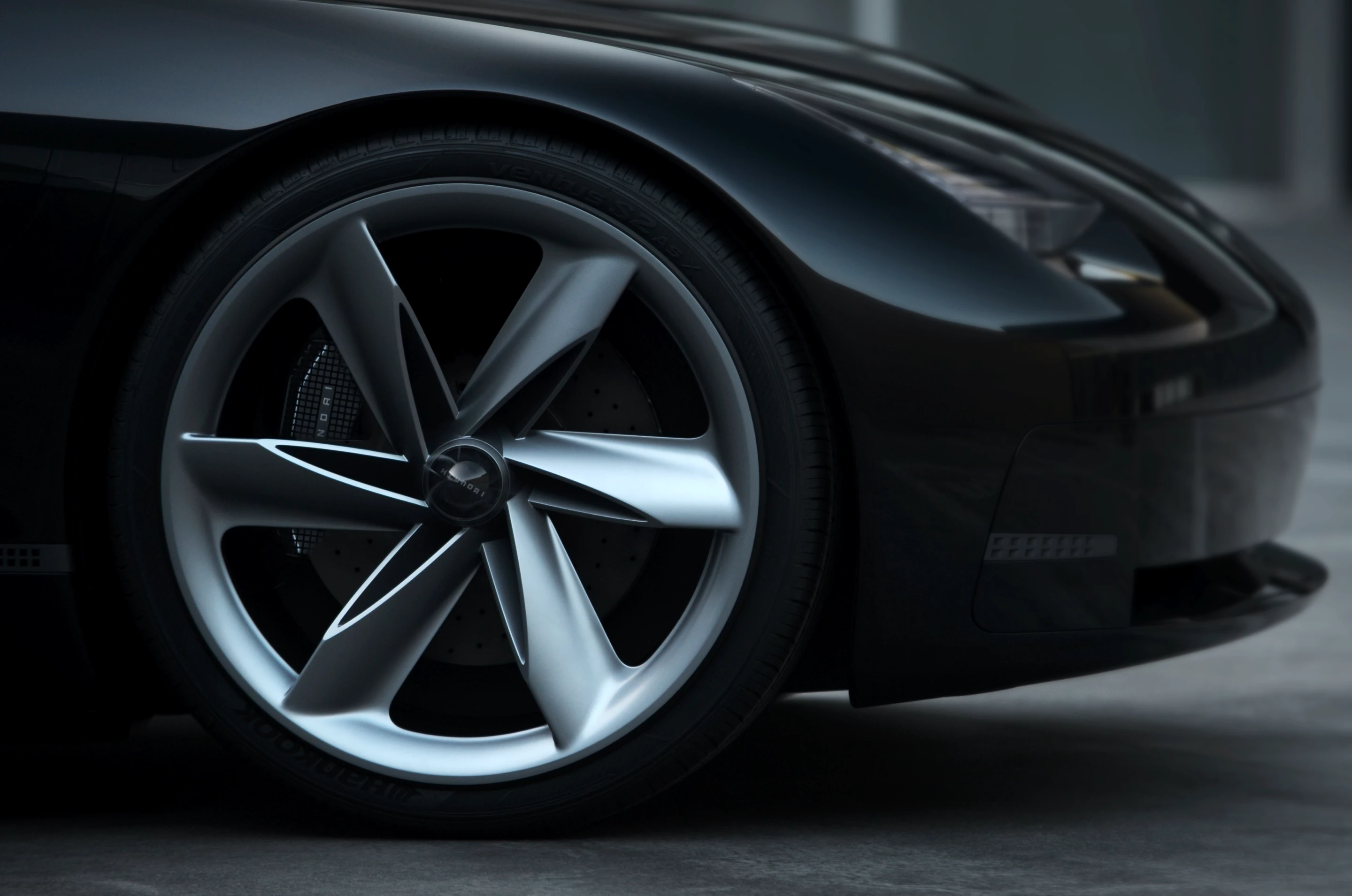 The propeller-like wheels are designed to draw air in and over the body
