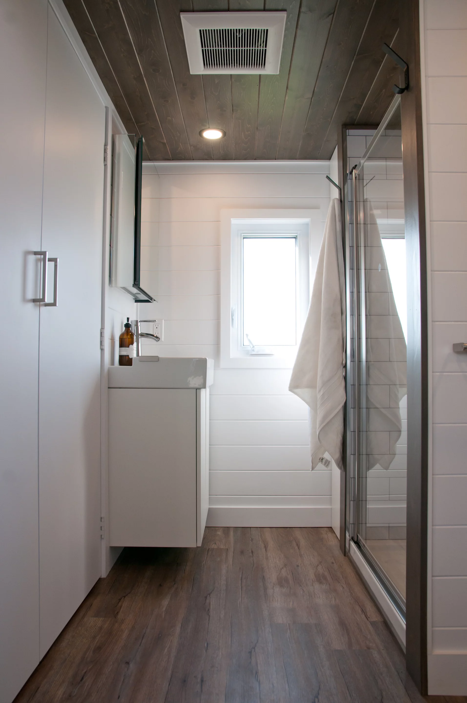 The Baobab's bathroom includes a toilet, shower and vanity sink