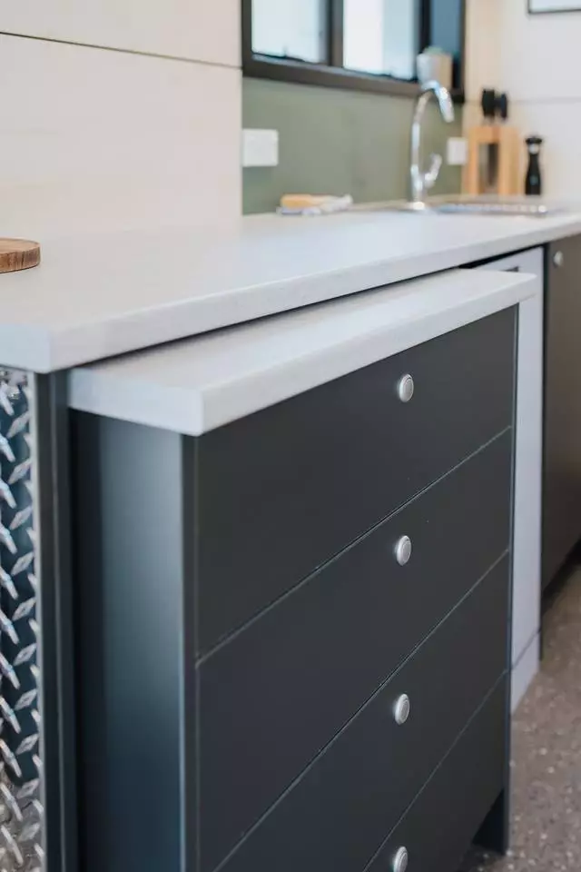 La Sombra Tiny House's kitchen includes a removable unit on wheels