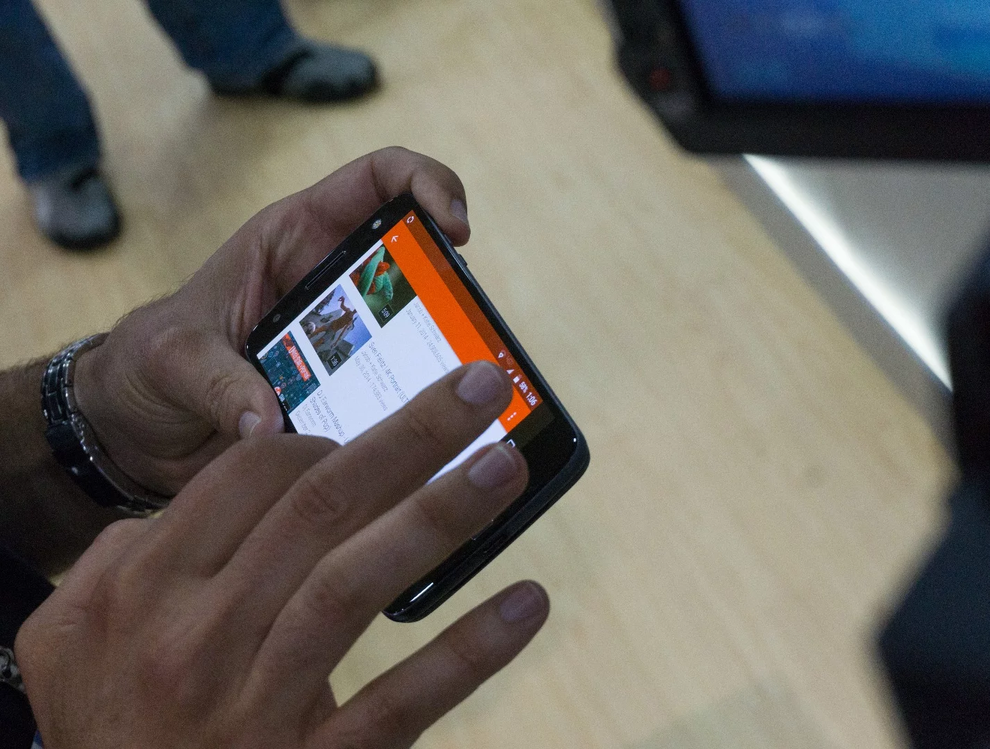 The Moto Z with Insta-Share module, projecting a demo onto a wall