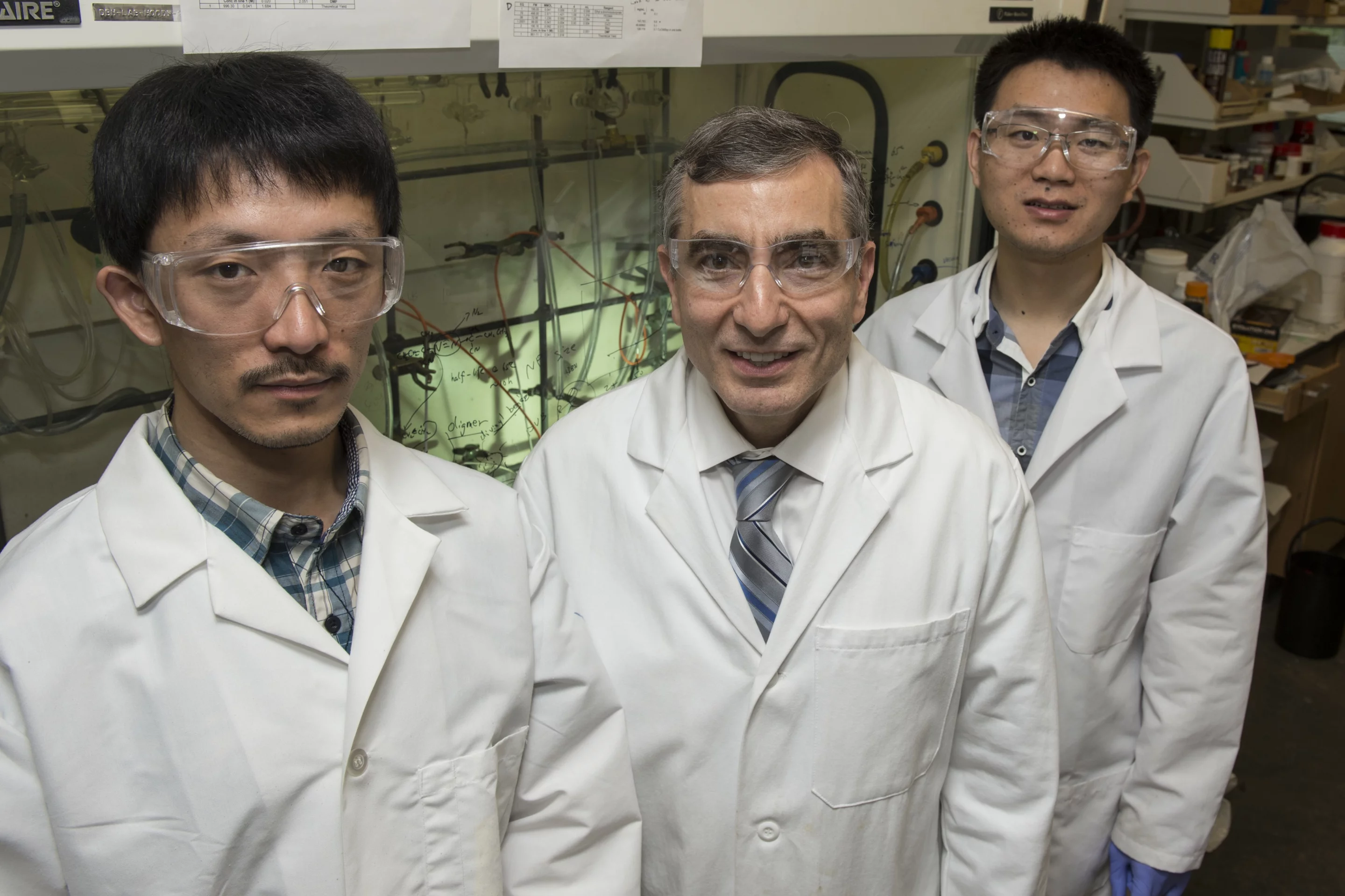 Rice University researchers have created a new flexible energy storage technology that uses no lithium – from left, postdoctoral researcher Yang Yang, Professor James Tour and graduate student Gedeng Ruan (Image: Tour Group/Rice University)