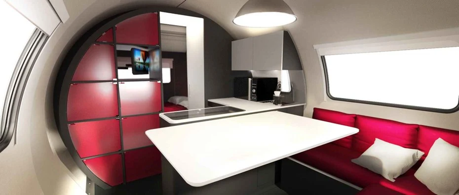 The furniture folds out automatically when the Beauer 3X expands, creating a multi-room interior