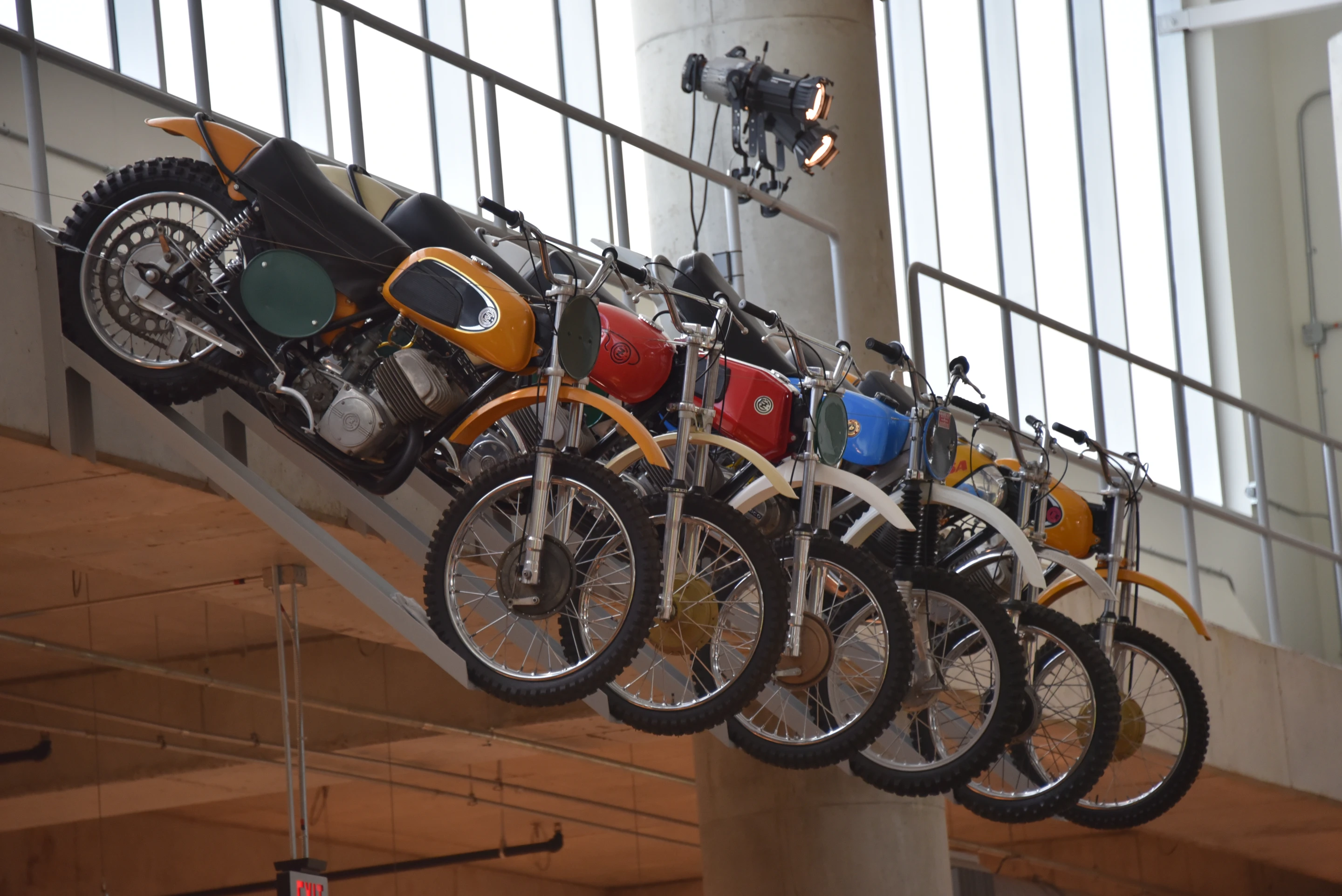 An assortment of small dirt bikes used as decoration over the lunchroom